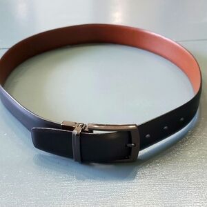 Mens black leather belt. 30 to 32 I believe that it will fit Good used condition